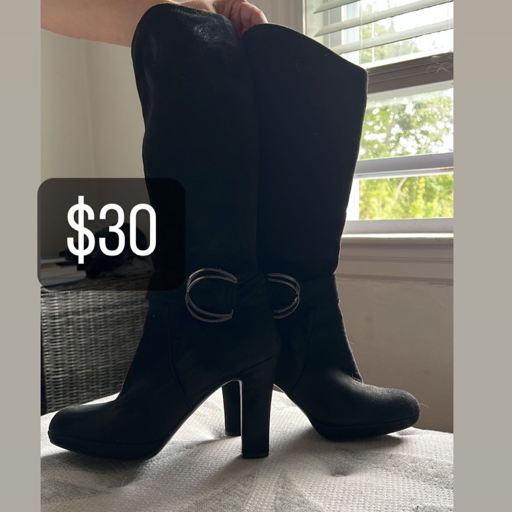 Tall black high heel boots